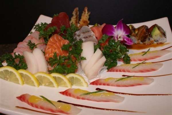 Sushi roll with sesame garnish at Kenzo